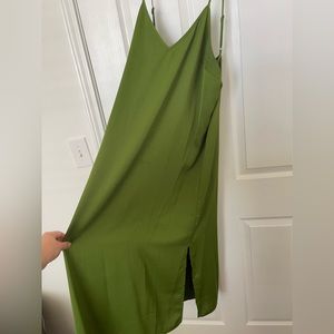 A New Day: XL silk green dress with a slit on the left side. Worn once.